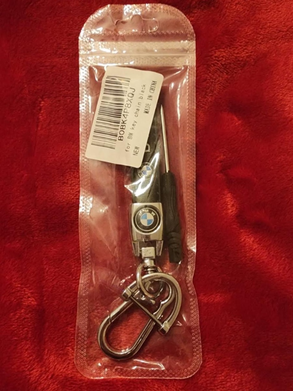 BMW-branded leather and zinc alloy car keychain